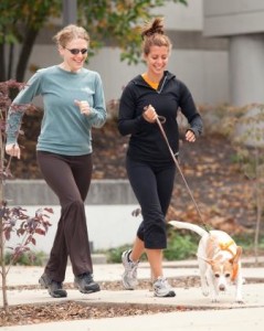 Public Health students jogging with dog
