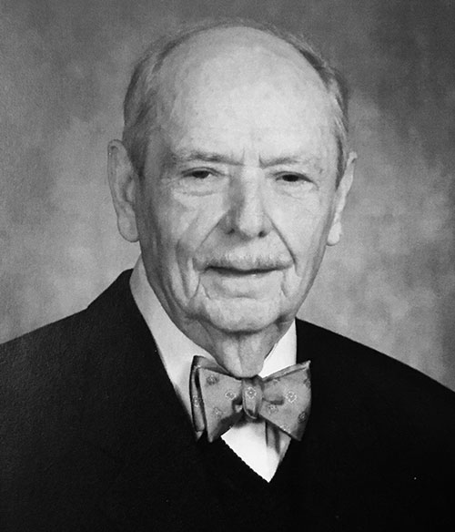 Black and white formal photograph of Dr. Robert Pursley